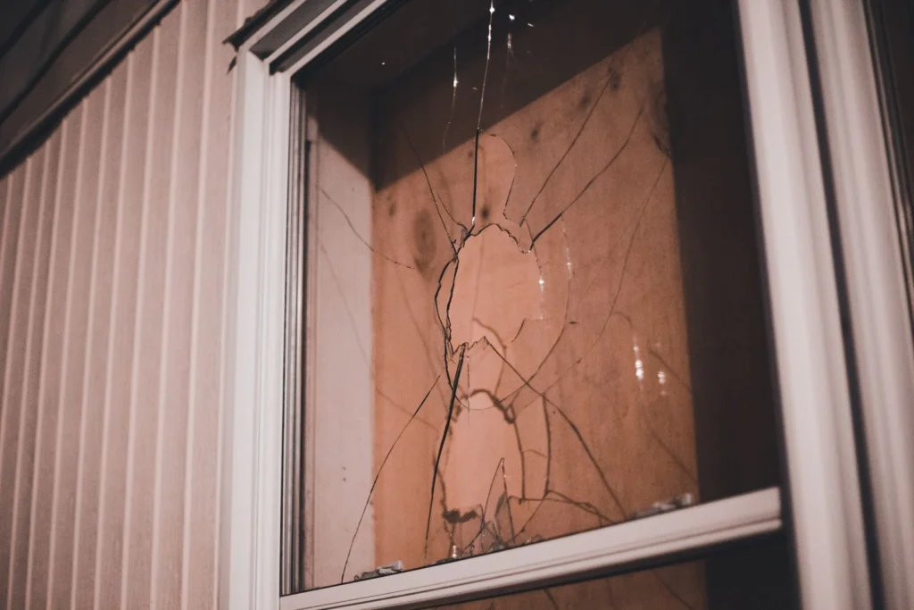 Cracked window pane at night