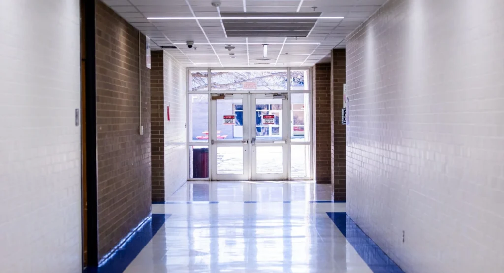 Campus hallway with glass entry doors